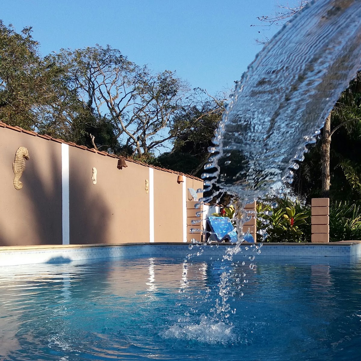 Piscina com cascata do Recanto Pousada Sonho Meu em Analândia